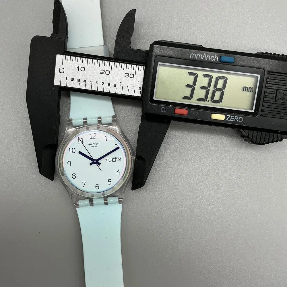 Swatch Ultraciel GE713 Womens Watch 34mm Blue Dial White Day Date